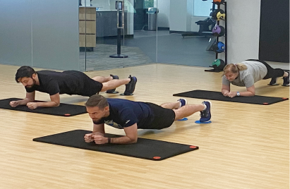 NICO employees working out together during gym session