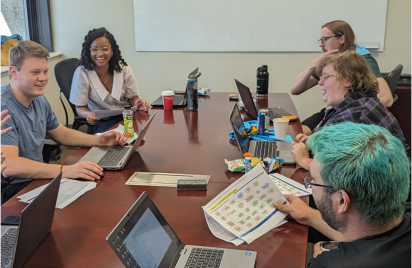 NICO employees participating in Hackathon coding event